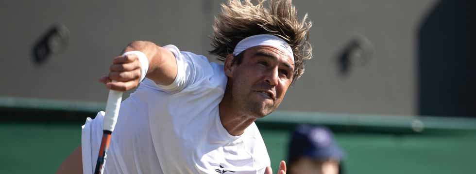 Marcos Surges Into Second Round At Wimbledon